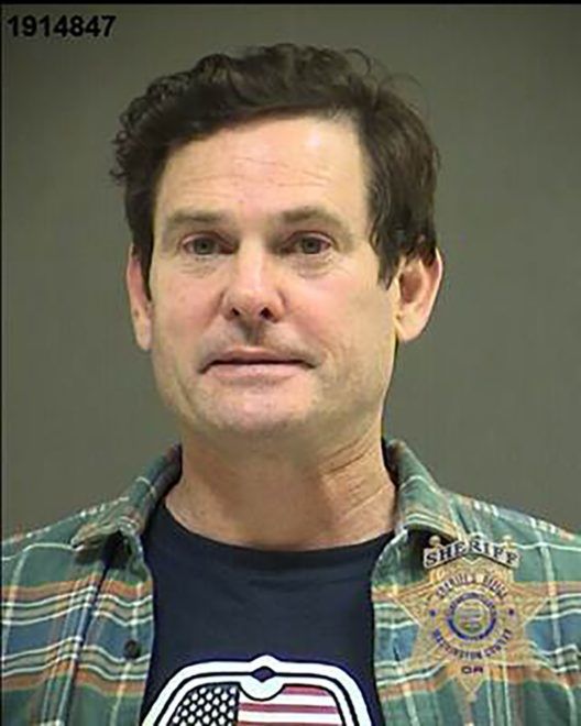 Henry Thomas rendőrségi fotója 