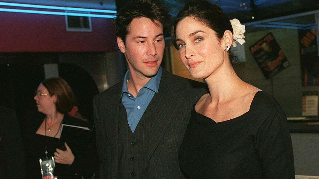 Carrie Ann Moss-szal a Mátrix ausztráliai premierjén. Amikor a filmet forgatták, Revees testvére leukémiával küzdött, és a színész rendszeresen ápolta. (Fotó: Getty Images)