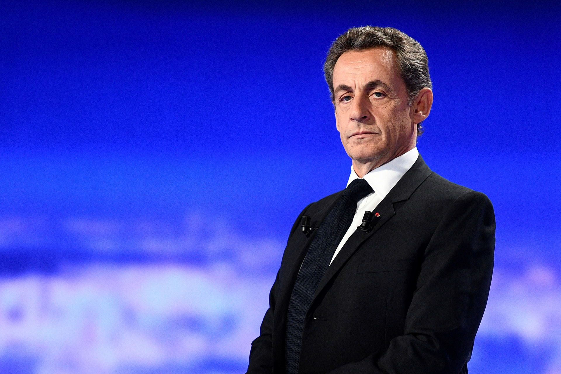 (FILES) In this file photo taken on October 13, 2016 Former French President and candidate for the right-wing Les Republicains (LR) party primaries Nicolas Sarkozy takes part in the first televised debate between the seven candidates for France's right-wing presidential nomination ahead of the 2017 presidential election, at the studios of French private television channel TF1 in La Plaine-Saint-Denis, north of Paris. - The Paris Court of Appeal is set to deliberate on September 24, 2020 on the appeals for nullity filed, among others, by Nicolas Sarkozy, Claude Gueant and businessman Alexandre Djouhri, against the investigation into suspicions of Libyan financing by the candidate of the right in the 2007 presidential campaign. (Photo by Martin BUREAU / various sources / AFP)