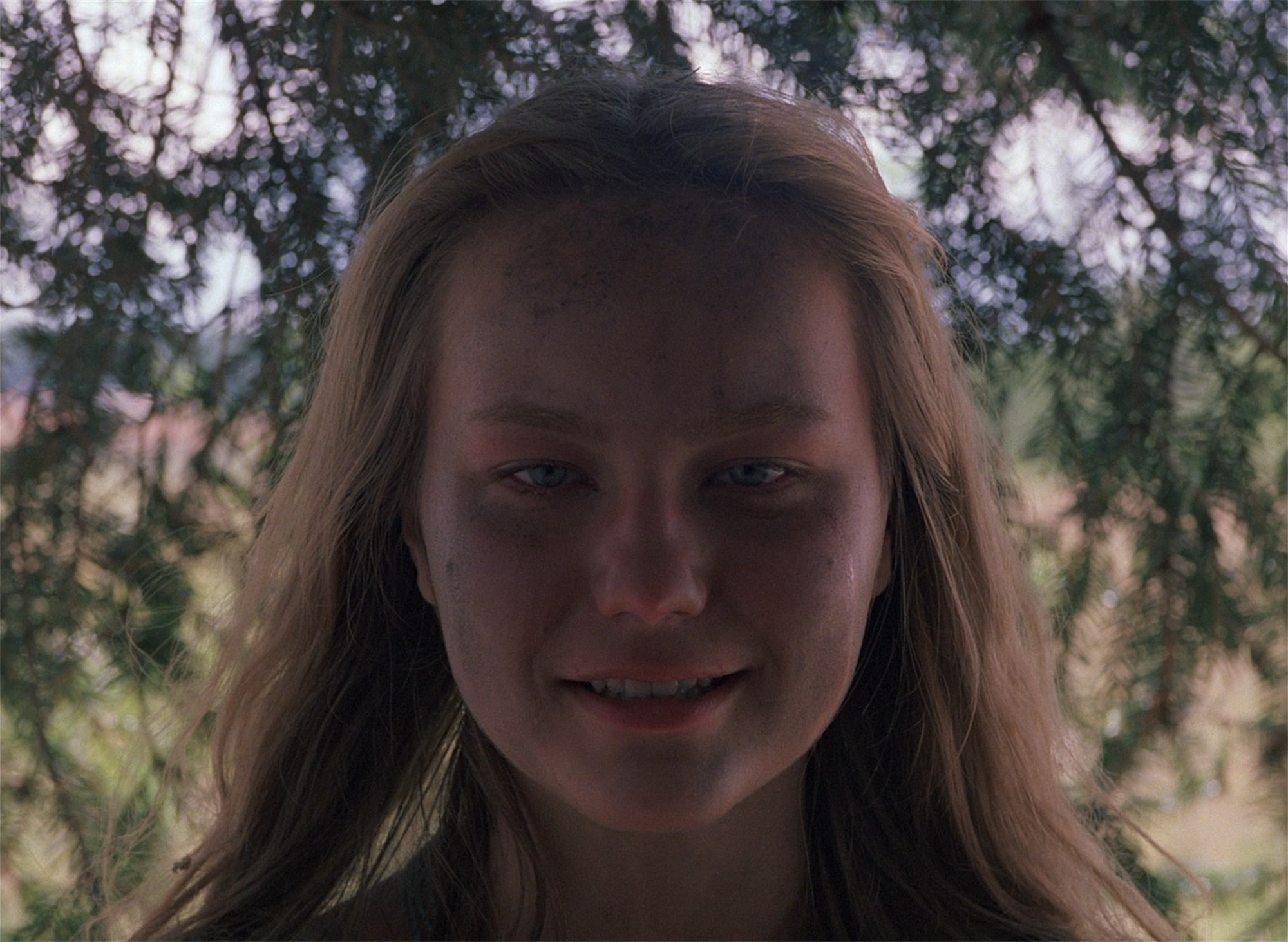 Arcok a Jöjj és lásd! című filmből