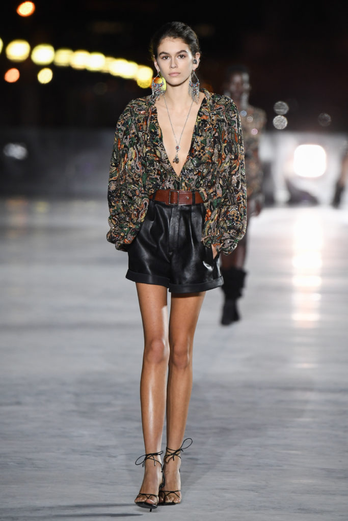 PARIS, FRANCE - SEPTEMBER 26: Kaia Gerber walks the runway during the Yves Saint Laurent Spring Summer 2018 show as part of Paris Fashion Week at on September 26, 2017 in Paris, France. (Photo by Stephane Cardinale - Corbis/Corbis via Getty Images)