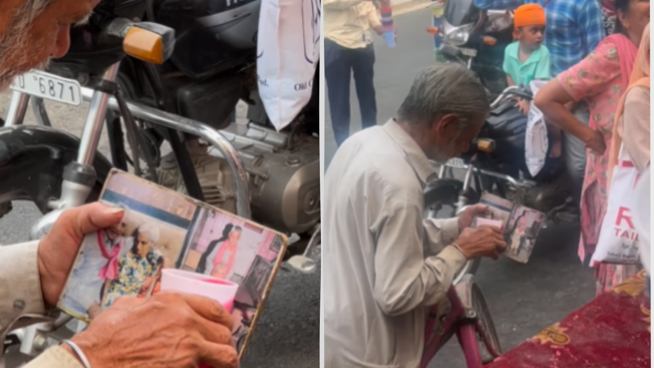 Egy férfi könnyes szemmel tartja a felesége fotóját