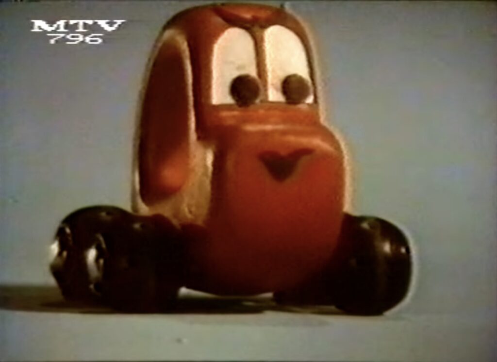 Autó a Szőnyegváros nevű játék reklámjában